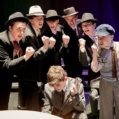 Fat Sam's Gang. A scene from An Grianán Youth Theatre/On Cue Academy production of Bugsy Malone, Jan 2020. Left to right - Amy Doherty, Darragh Ramsay, Rudi Murphy Brown, Patrick McCormack, Isaac Morrison, Ethan Barron and (crouching) Evin O'Donnell. Photo by Paul McGuckin. All rights reserved.